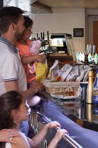 family ordering at horizon bar onboard condor lliberation